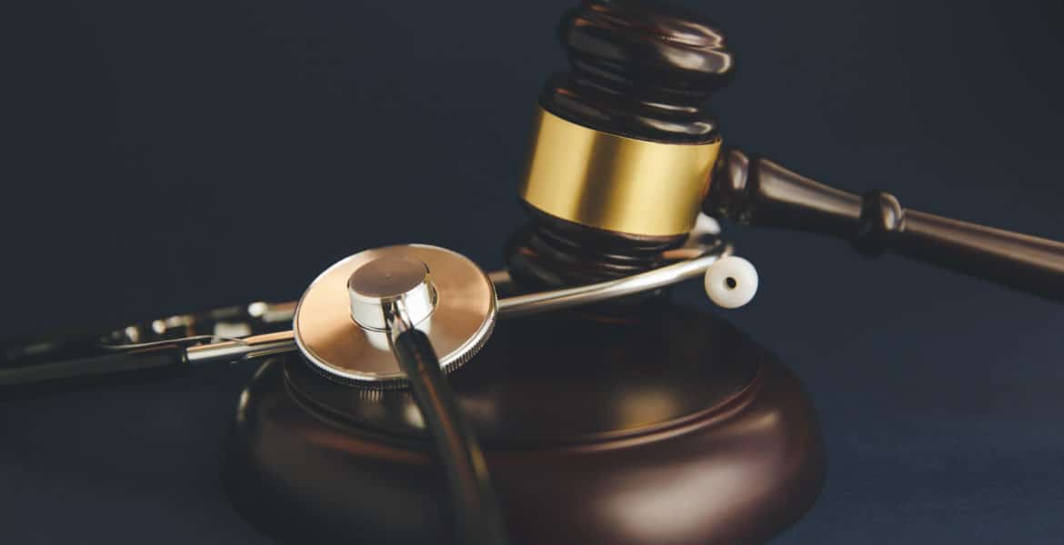 judges mallot and stethoscope in courtroom