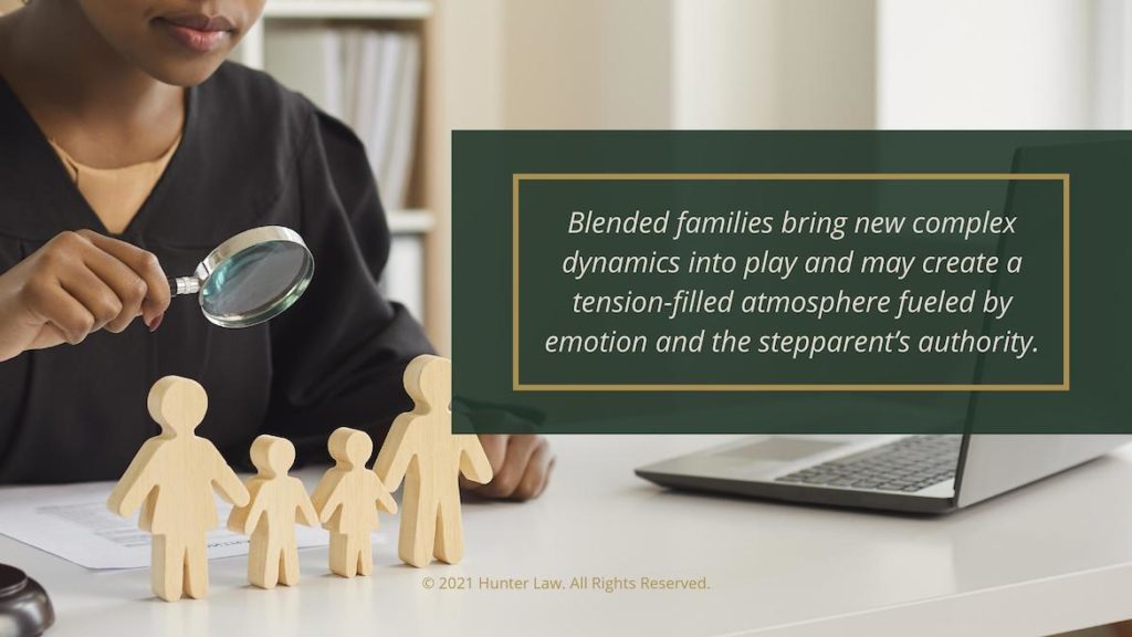 Callout 3- judge looking at wooden family- Text: Blended families bring new complex dynamics