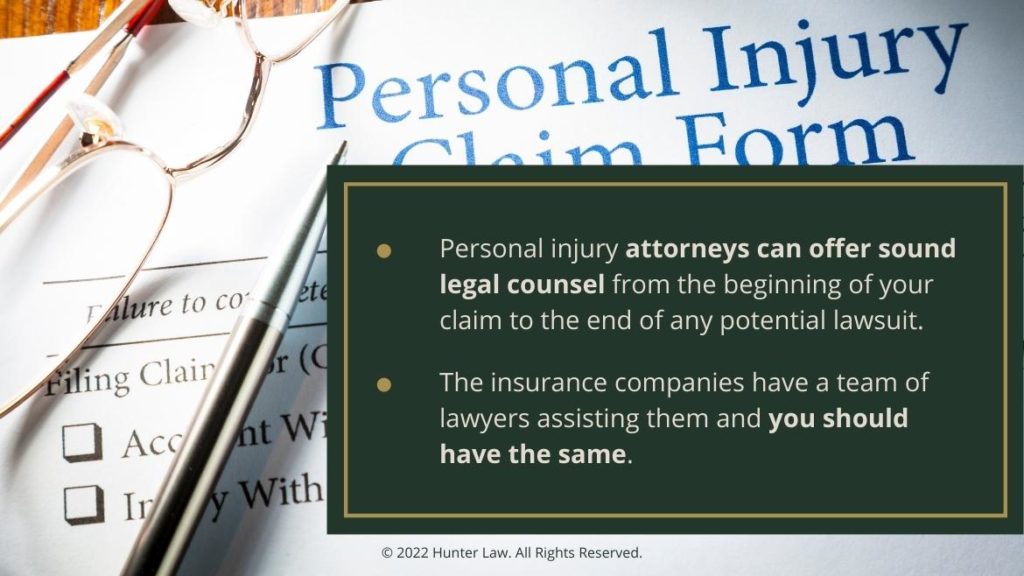 Callout 1: Personal injury claim form on desk with pen - Personal injury attorneys can offer sound legal counsel