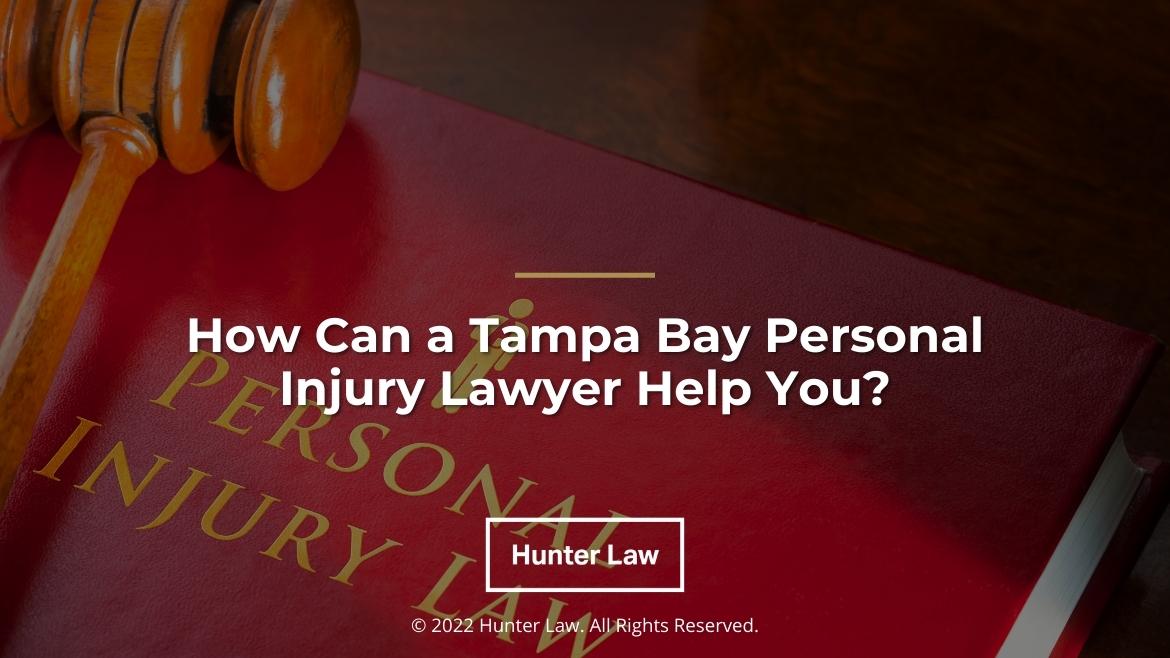 Featured: Red personal injury law book with judge's gavel on desk- How Can a Tampa Bay Personal Injury Lawyer Help You?