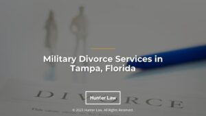 Featured: Divorce decree on white silhouette of divorcing couple- Military Divorce Services in Tampa, Florida