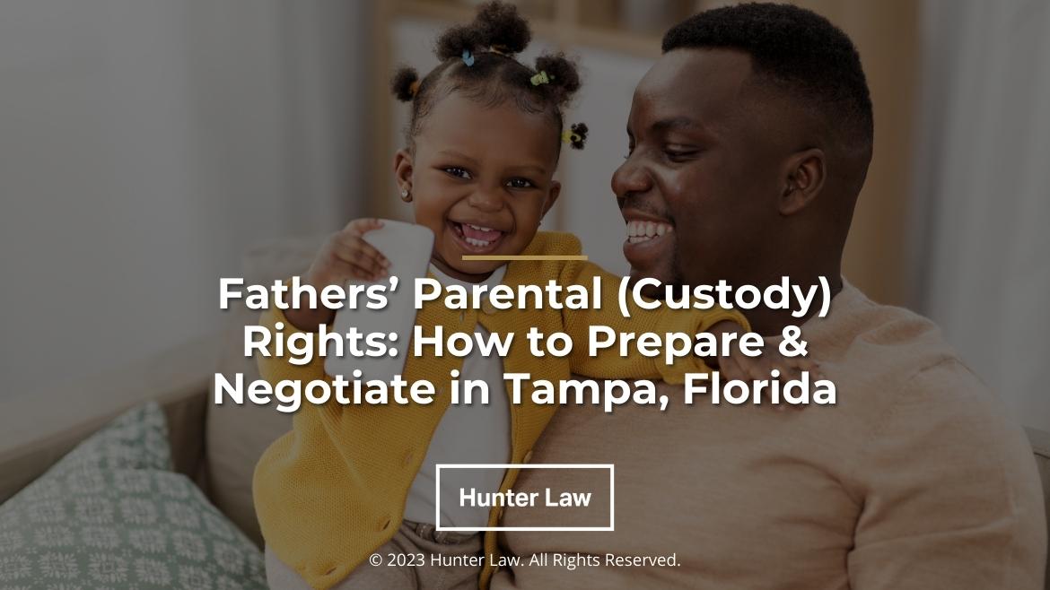 Featured: African-American father smiling holding baby daughter- Father's Parental (Custody) Rights : How to Prepare & Negotiate in Tampa, Florida