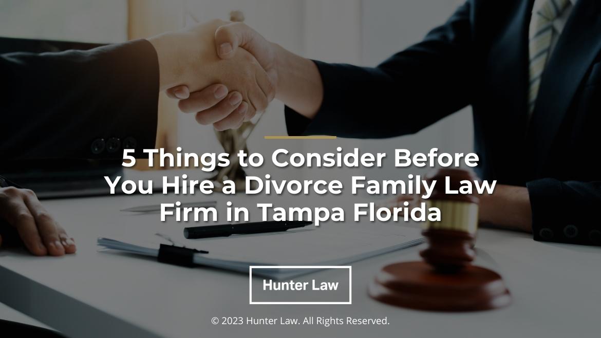Featured: Client shakes hands with attorney- 5 things to consider before you hire a divorce family law firm in Tampa Florida