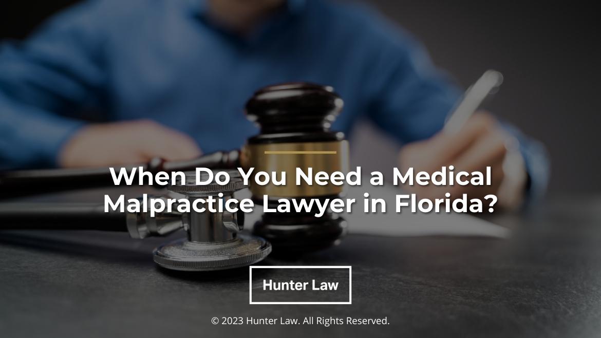 Featured: Medical malpractice lawyer at desk, judges gavel- When do you need a medical malpractice lawyer in Florida?