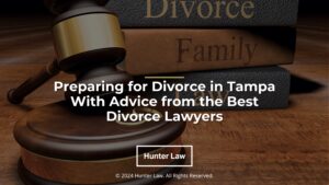 Featured: Judges gavel, divorce books, wedding rings on desk- Preparing for divorce in Tampa with advice from the best divorce lawyers