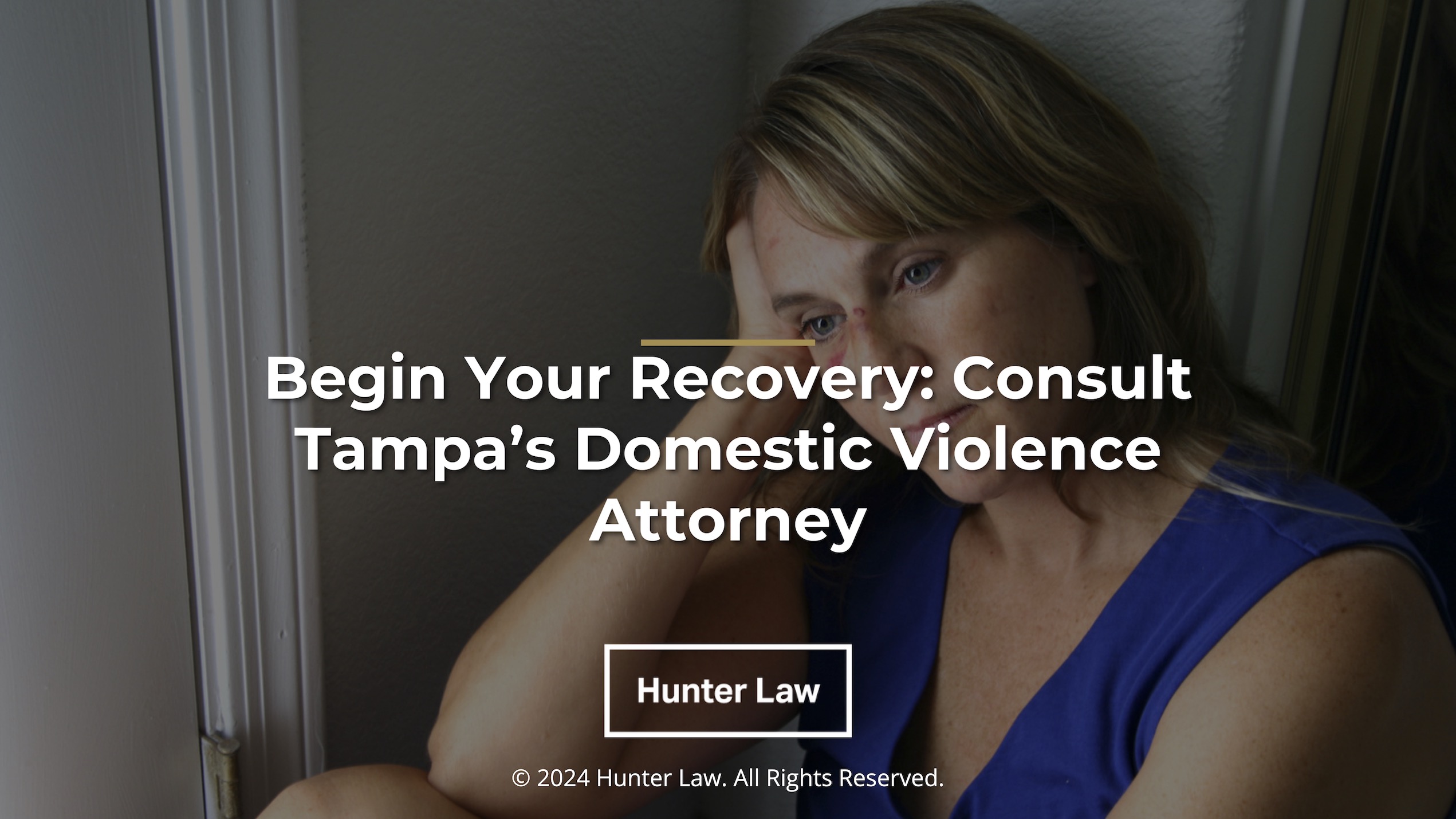 Featured: Physically abused female sitting with hand on head- Begin your recovery: consult Tampa's domestic violence attorney