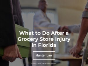 Lawyer and injured man on crutches meet with doctor- what to do after a grocery store injury in Florida.