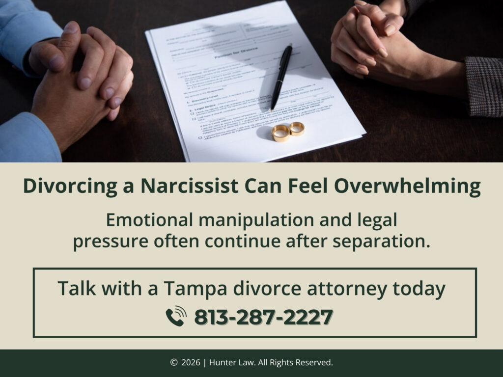 Two people sit across from each other with divorce document on desk. Hunter Law phone number.
