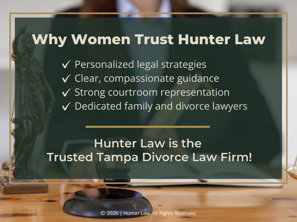 Female lawyer sitting at desk with scales of justice and gavel. Four reasons women trust Hunter Law. 