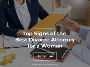 Female lawyer handing over legal documents to client. Article title.
