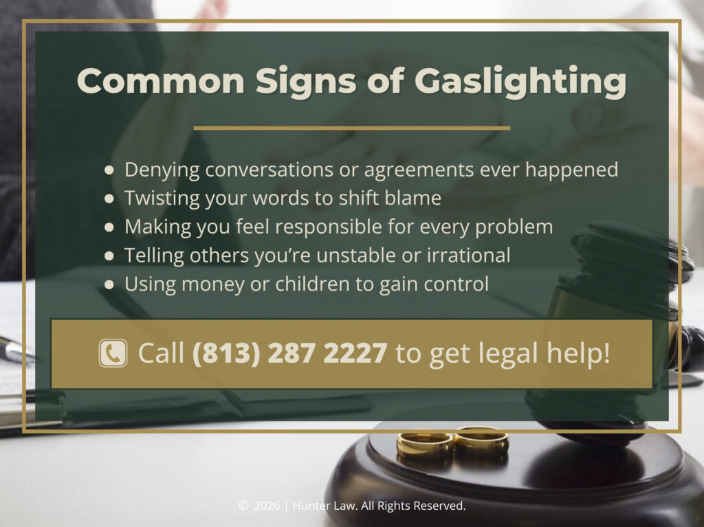 Judges gavel and two wedding rings on desk. Five common signs of gaslighting.
